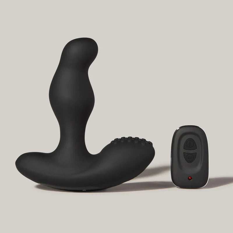giddi thor rotating prostate massager black silicone with remote control on a grey background