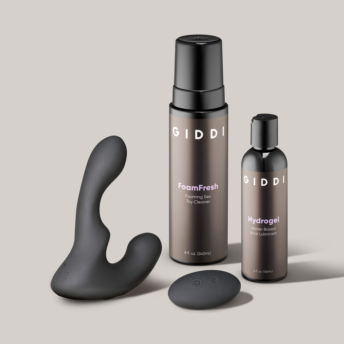 Giddi personal care products including a foam fresh cleaner, hydrogel, and a black silicone product on a beige background.