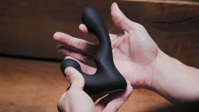 video thumbnail of giddi tomo 2 come hither prostate massager showing tomo held in hand with play button in center